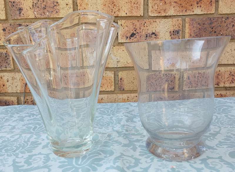 Two ornate glass vases sold