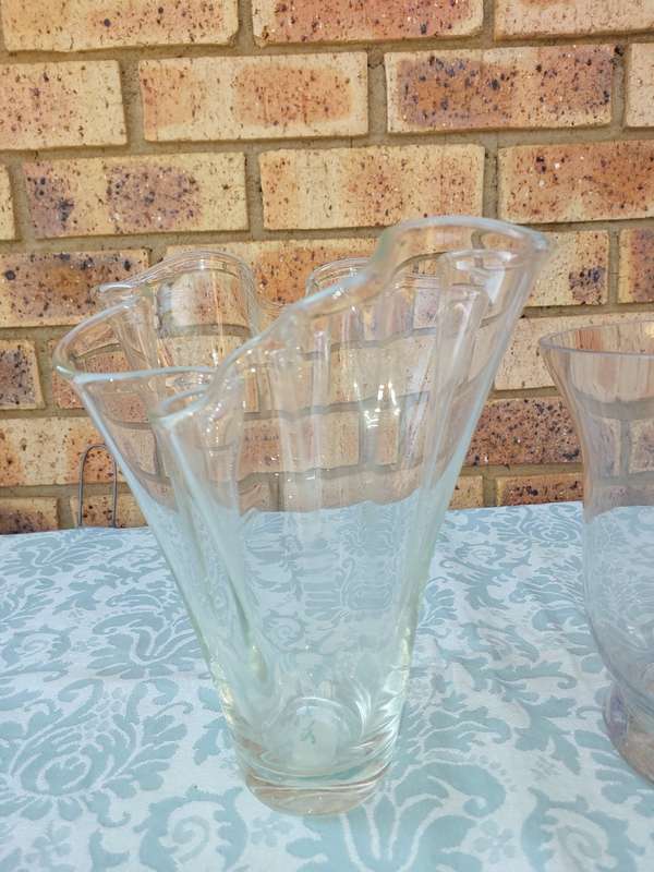 Two ornate glass vases sold