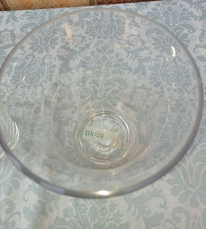 Two ornate glass vases sold