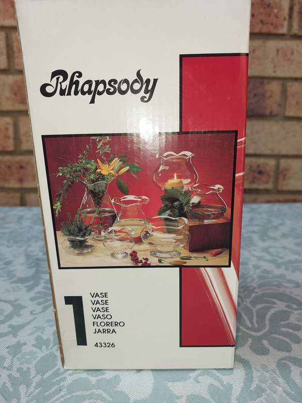 A RHAPSODY GLASS VASE SOLD AS IS