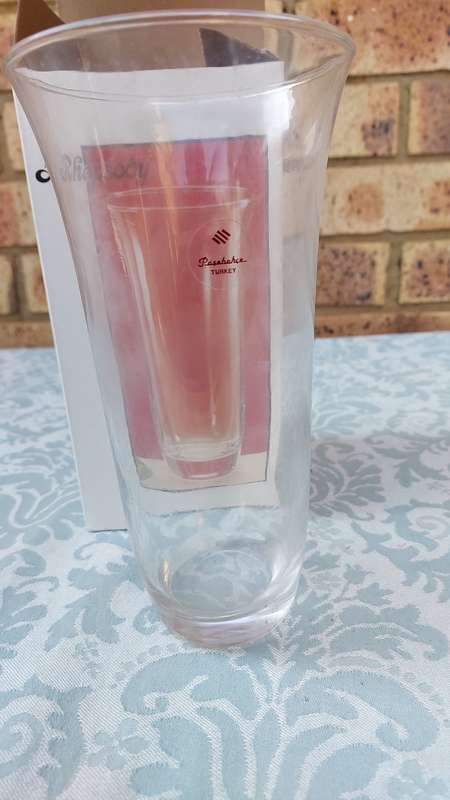 A RHAPSODY GLASS VASE SOLD AS IS