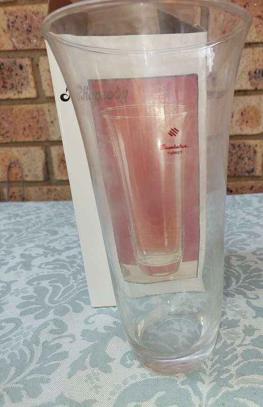 A RHAPSODY GLASS VASE SOLD AS IS