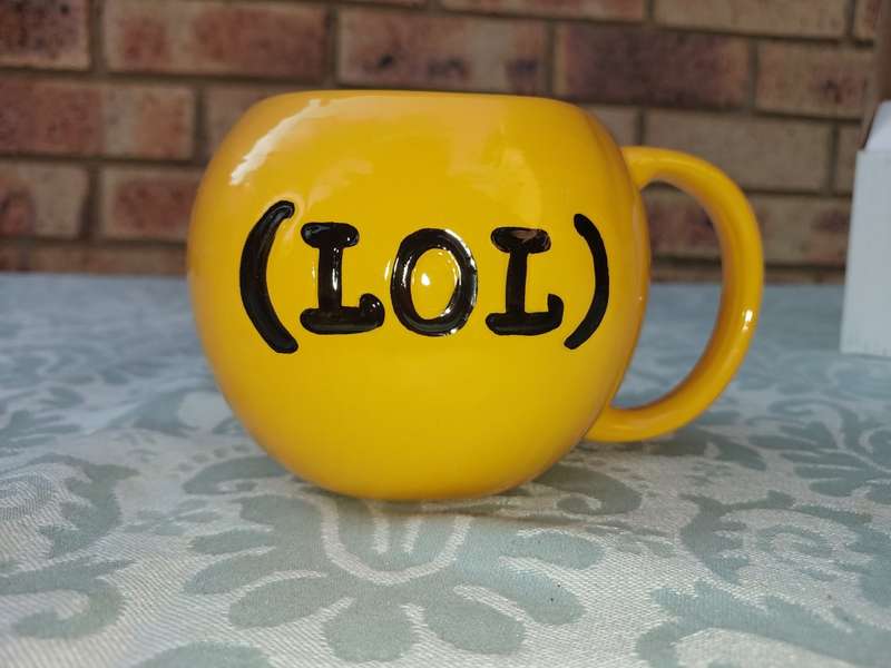 A COLLECTION OF KITCHENALIA AND NOVELTY UTENSILS SOLD AS IS