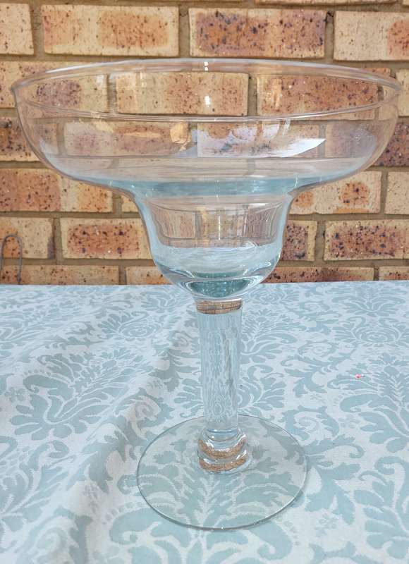 A COLLECTION OF  EXTRA LARGE GLASS SWEATS STANDS SOLD AS IS