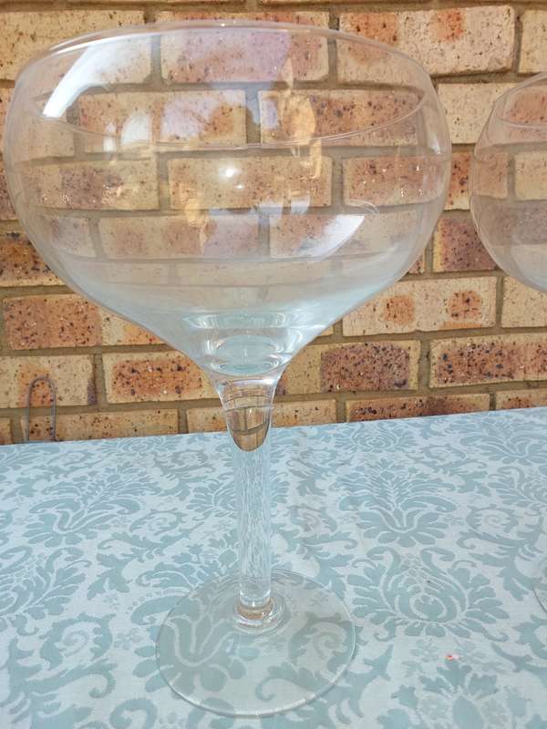A COLLECTION OF  EXTRA LARGE GLASS SWEATS STANDS SOLD AS IS