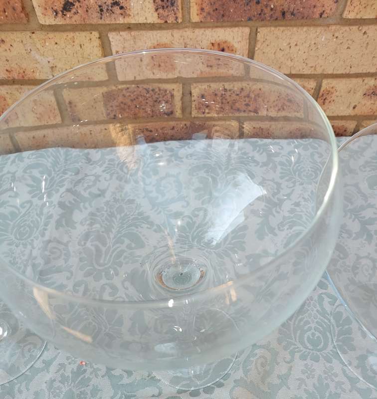 A COLLECTION OF  EXTRA LARGE GLASS SWEATS STANDS SOLD AS IS