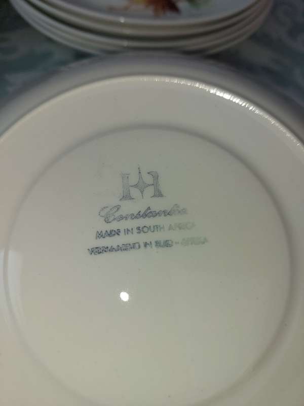 A SET 0F 18 SAUCERS CONSTANTIA MADE IN SOUTH AFRICA