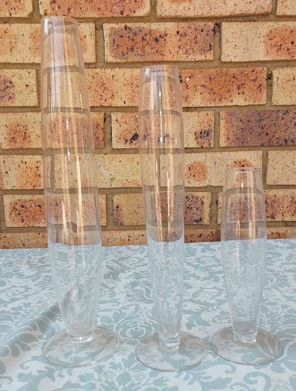 A COLLECTION OF THREE ART DECOR FLUTED GLASS VASES
