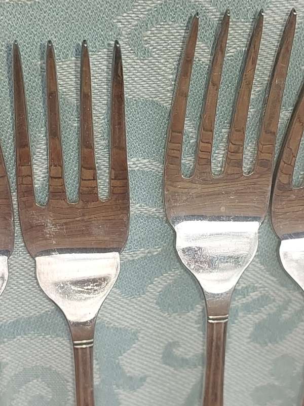 A VINTAGE SET OF SIX FORKS EPNS A1