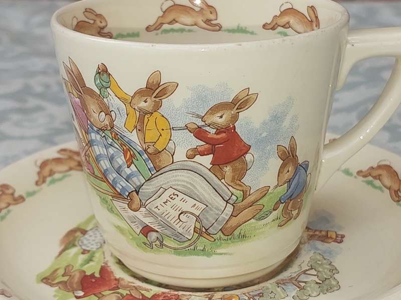 A RARE ROYAL DOULTON BUNNYKINS TEA CUP AND SAUCER