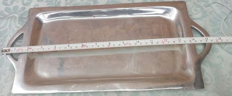 A VINTAGE RECTANGULAR SERVING PLATTER SOLD AS IS