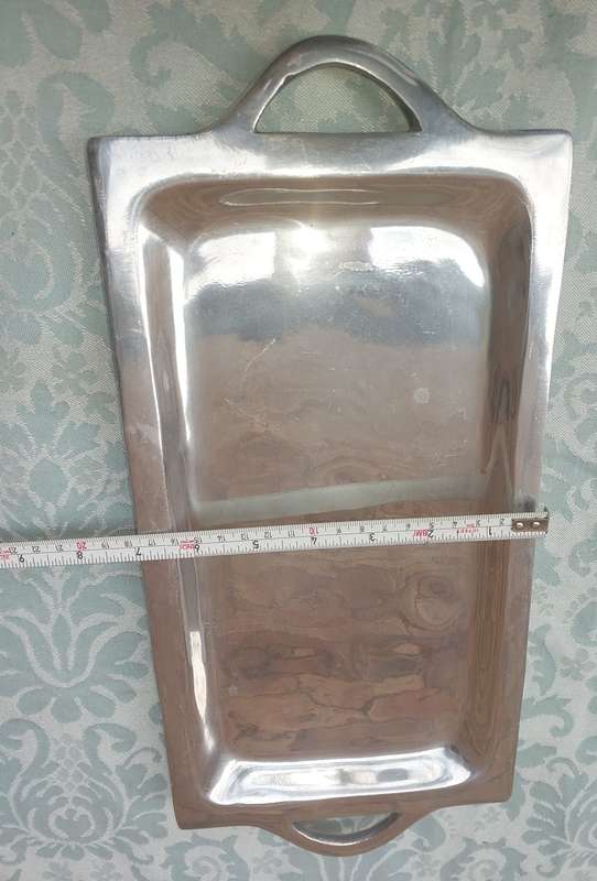 A VINTAGE RECTANGULAR SERVING PLATTER SOLD AS IS
