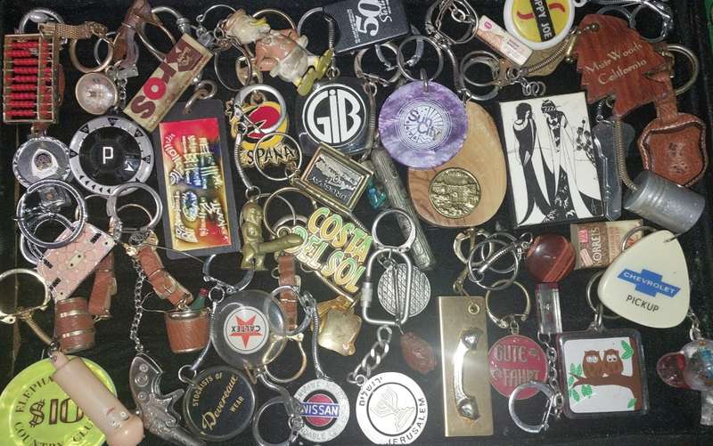 A bulk collection of erotica key rings sold  as is