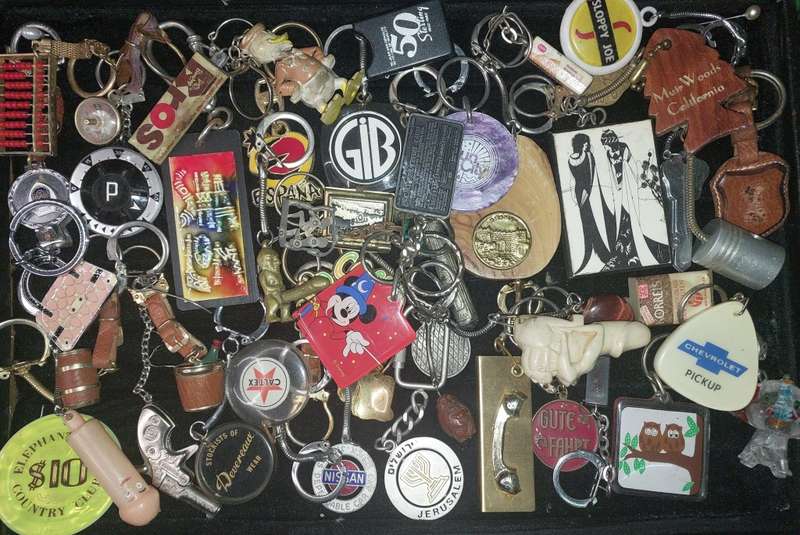 A bulk collection of erotica key rings sold  as is