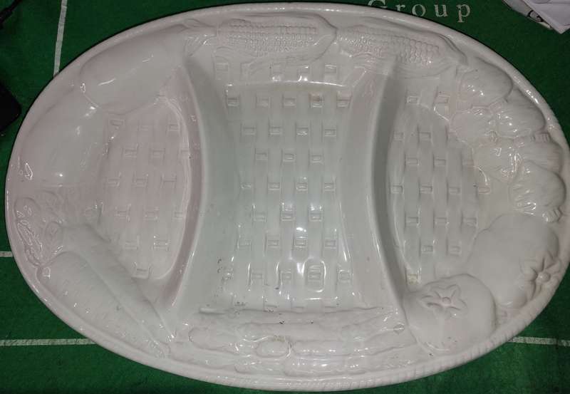 AN OVAL DIVIDED DISH PORCELAIN CERAMIC
