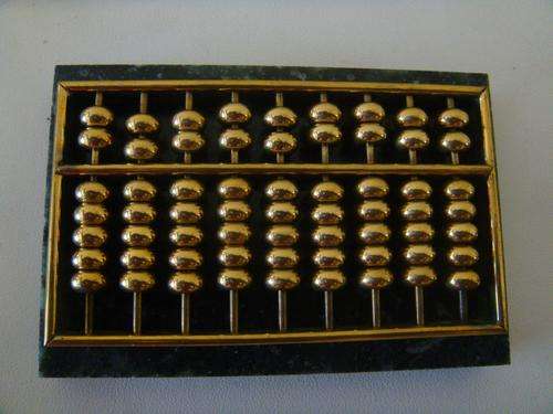 MINI ABACUS ON GREEN MARBLE/GRANITE