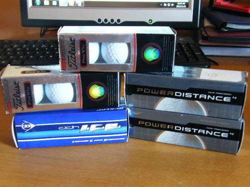 A SELECTION OF 15 GOLF BALLS.BRAND NEW.6xFITLEIST,6xPOWERDISTANCE AND 3xDUNLOP.