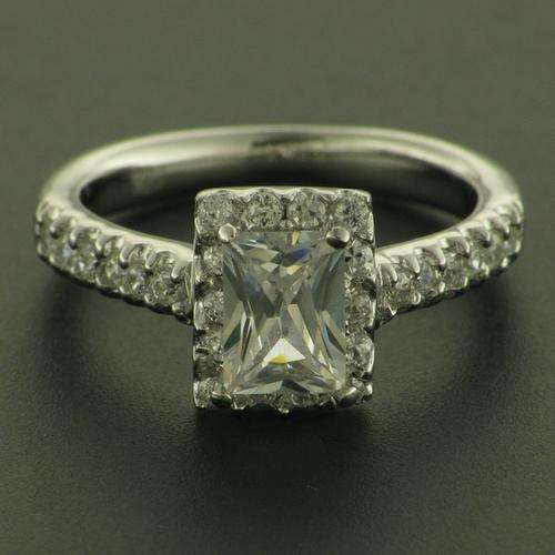 S/SILVER EMERALD CUT CZ 4 CLAW SET RING