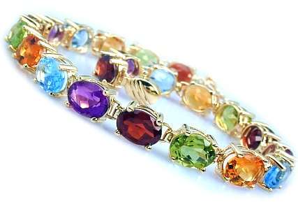 THIS IS A ABSOLUTELY BEAUTIFUL ITEM!  TOPAZ SILVER  LINK  BRACELET! WORTH IT!!!