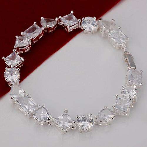THIS IS A ABSOLUTELY BEAUTIFUL ITEM! TOPAZ SILVER LINK BRACELET! WORTH IT!!!