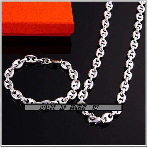 THIS IS A ABSOLUTELY BEAUTIFUL SILVER - NECKLACE WITH BRACELET SET STAMPED 925 - MUST BID!