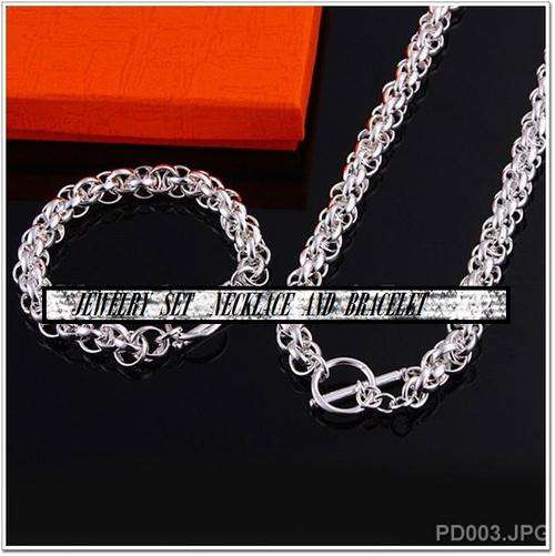 THIS IS A ABSOLUTELY BEAUTIFUL SILVER - NECKLACE WITH BRACELET SET STAMPED 925 - MUST BID!