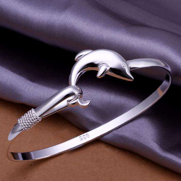NEW STOCK... PLEASE LOOK!!IMPRESSIVE SILVER DOLPHIN BANGLE! 925 SILVER STAMP NEVER BEFORE FOR R1-00!