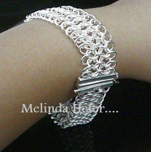 NEW STOCK... PLEASE LOOK!! IMPRESSIVE SILVER BRACELET!925 SILVER STAMP NEVER BEFORE FOR R1-00!!!!