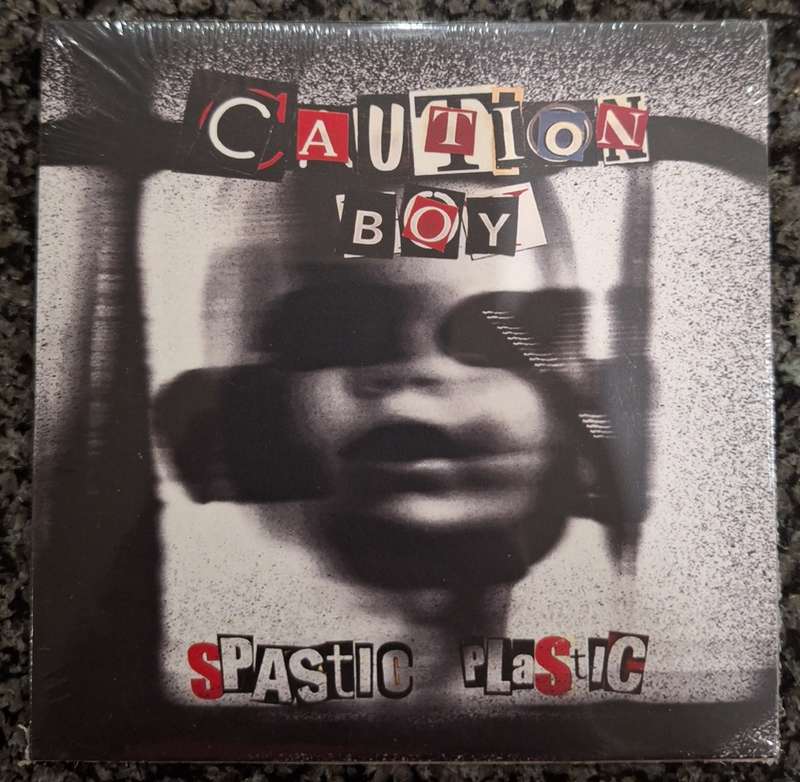 Caution Boy - Spastic Plastic