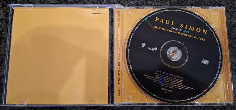 Paul Simon - Greatest Hits: Shining Like a National Guitar