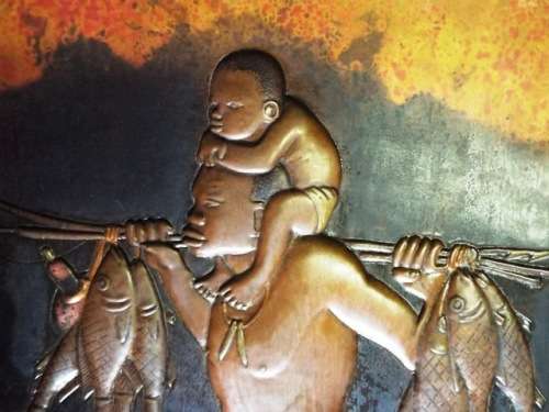 STUNNING COPPER RELIEF OF FISHERMAN