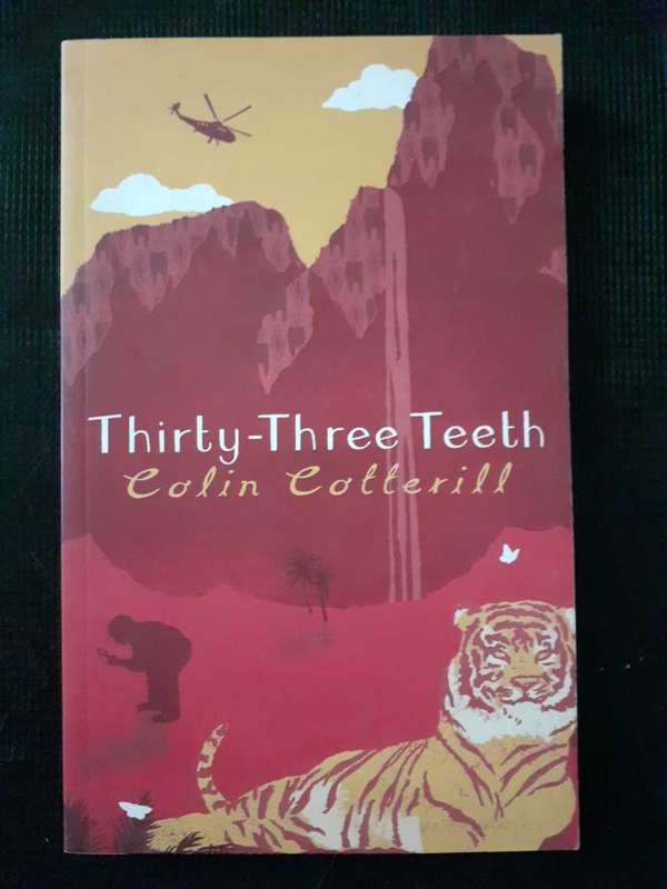 Thirty Three Teeth ~ Colin Cotterill