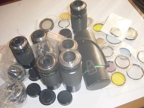 ASSORTED LOT OF FILM CAMERA LENSES AND LENSE FILTERS (AS YOU SEE THEM BELOW)