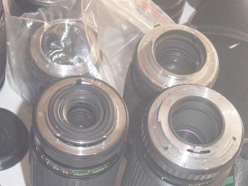 ASSORTED LOT OF FILM CAMERA LENSES AND LENSE FILTERS (AS YOU SEE THEM BELOW)