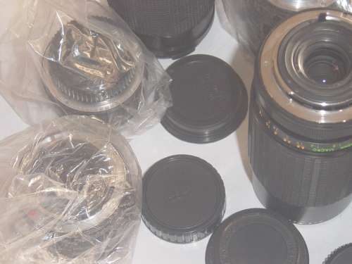 ASSORTED LOT OF FILM CAMERA LENSES AND LENSE FILTERS (AS YOU SEE THEM BELOW)