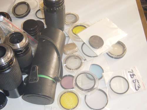 ASSORTED LOT OF FILM CAMERA LENSES AND LENSE FILTERS (AS YOU SEE THEM BELOW)