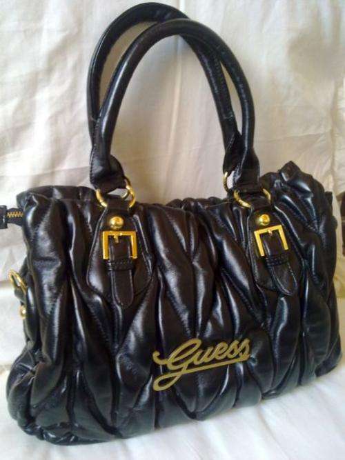 Beautiful black & gold Guess handbag