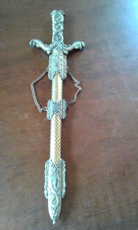 Sword as per photo's.