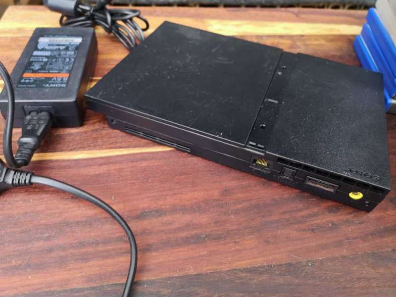 PS2 Slim - Chipped with Games (Not Working)