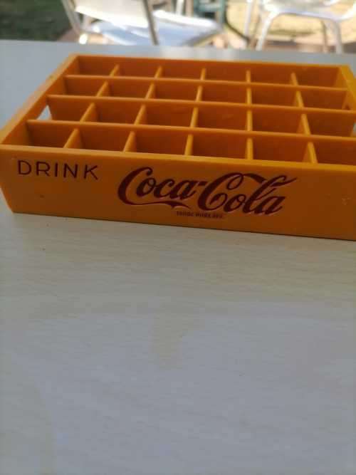Vintage miniature 24 Coca-Cola crate and Total Coca-Cola Yoyo
