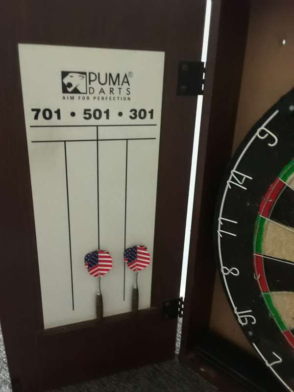 PUMA DART BOARD COMES WITH WOODEN CASE THAT CAN BE WALL MOUNTED