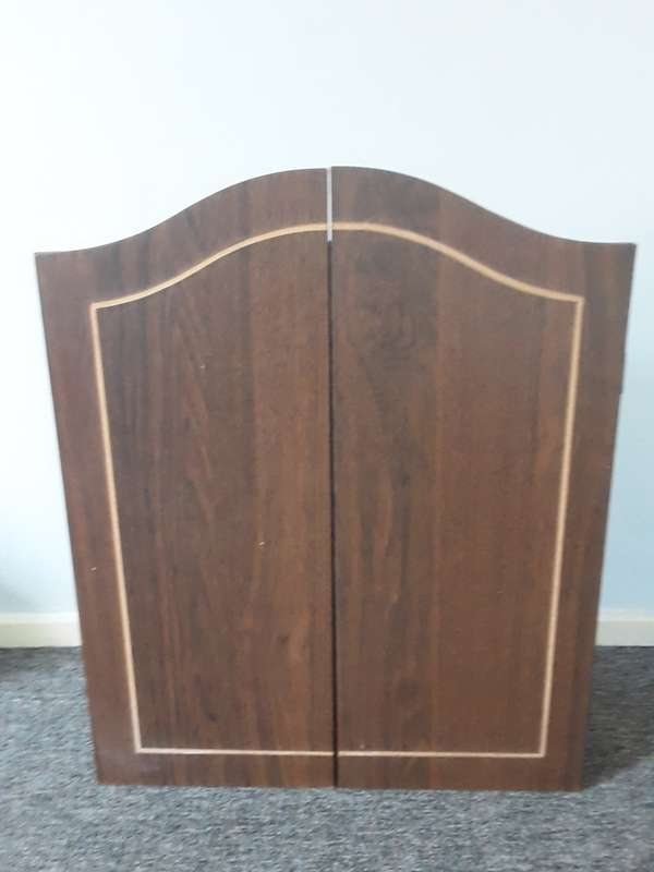 PUMA DART BOARD COMES WITH WOODEN CASE THAT CAN BE WALL MOUNTED
