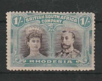 Rhodesia BSAC 1910 KGV Double Head perf 14 1s pur-black and blue-grn with gash in ear flaw fine mint