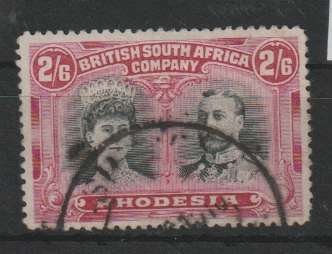 Rhodesia BSAC 1910 KGV Double Head perf 14 2s6 black and rose-carm with gash in ear flaw fine used