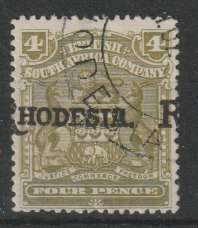 Rhodesia BSAC 1909 Arms Rhodesia 4d with overprint shifted left fine used