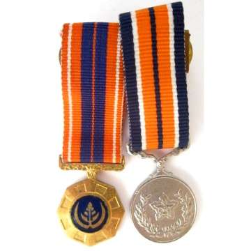 A Grouping of Two S.A.D.F. Miniature Medals.