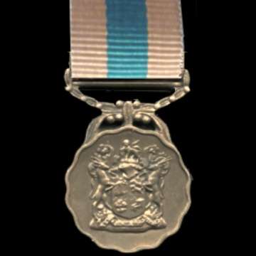 S.A.D.F. 10 year Good Service Medal (Bronze) with Ribbon - Full Size - Numbered 17801.