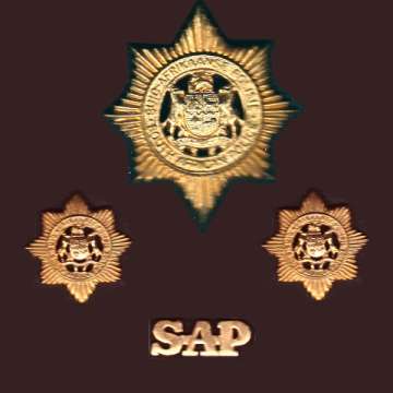 Old S.A.P. Cap and Collar Badges with Title Insignia.