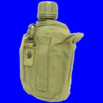 S.A.D.F. Water Bottle complete with its Canvass Cover which is fitted with a Belt Loop and Hook.