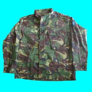 British Camo With Scottish Highlanders And Union Jack Insignia On Left Arm.